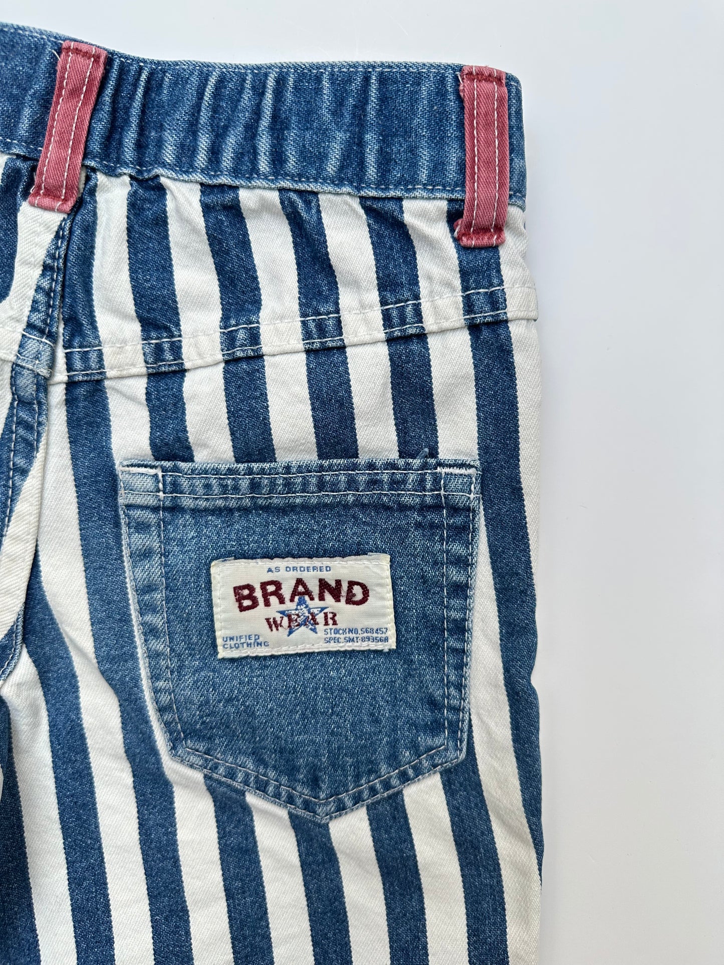 Kids vintage denim bold stripe shorts with red details and badge on back pocket. Made in UK. Age 5 years.