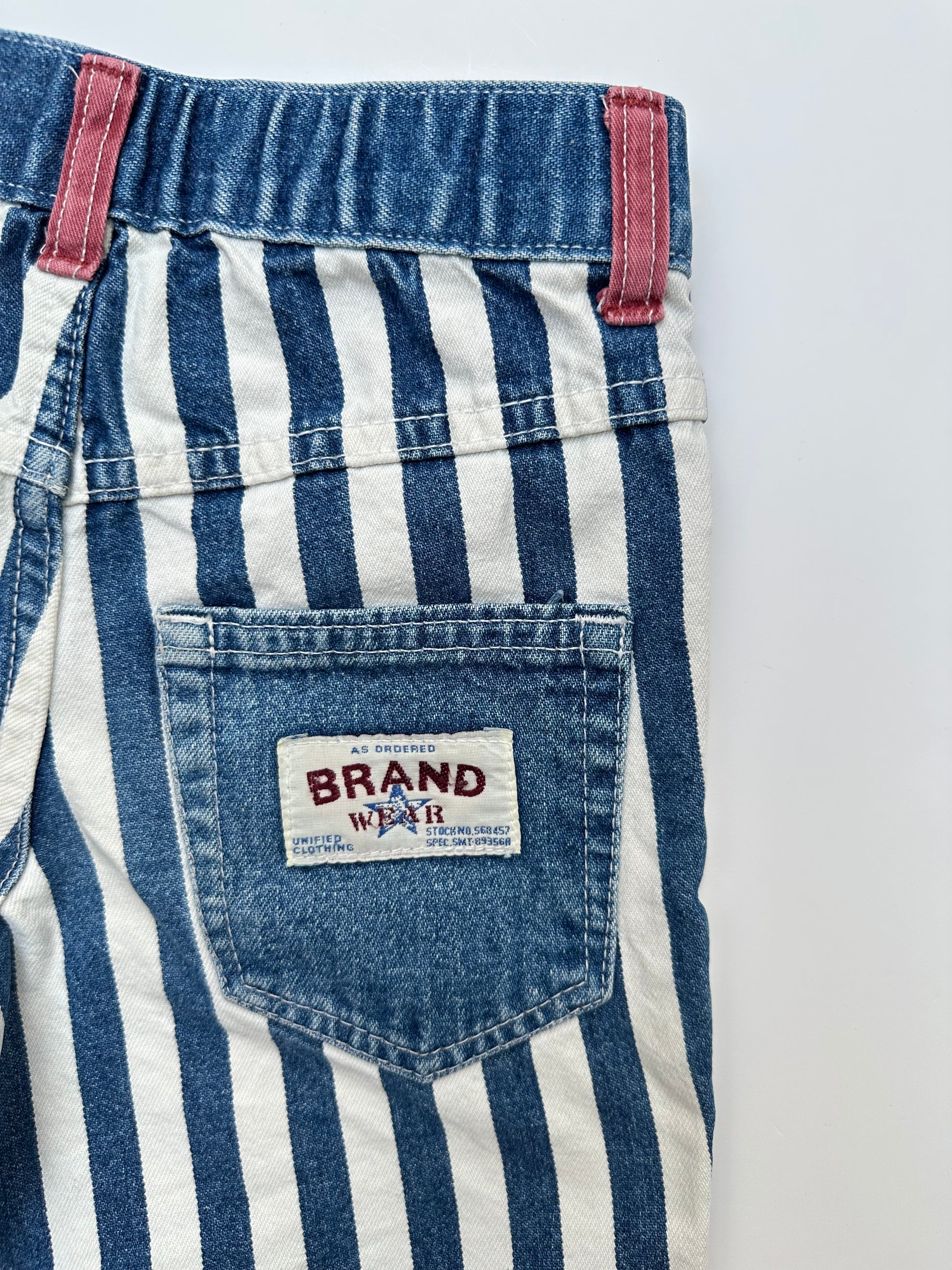 Kids vintage denim bold stripe shorts with red details and badge on back pocket. Made in UK. Age 5 years.