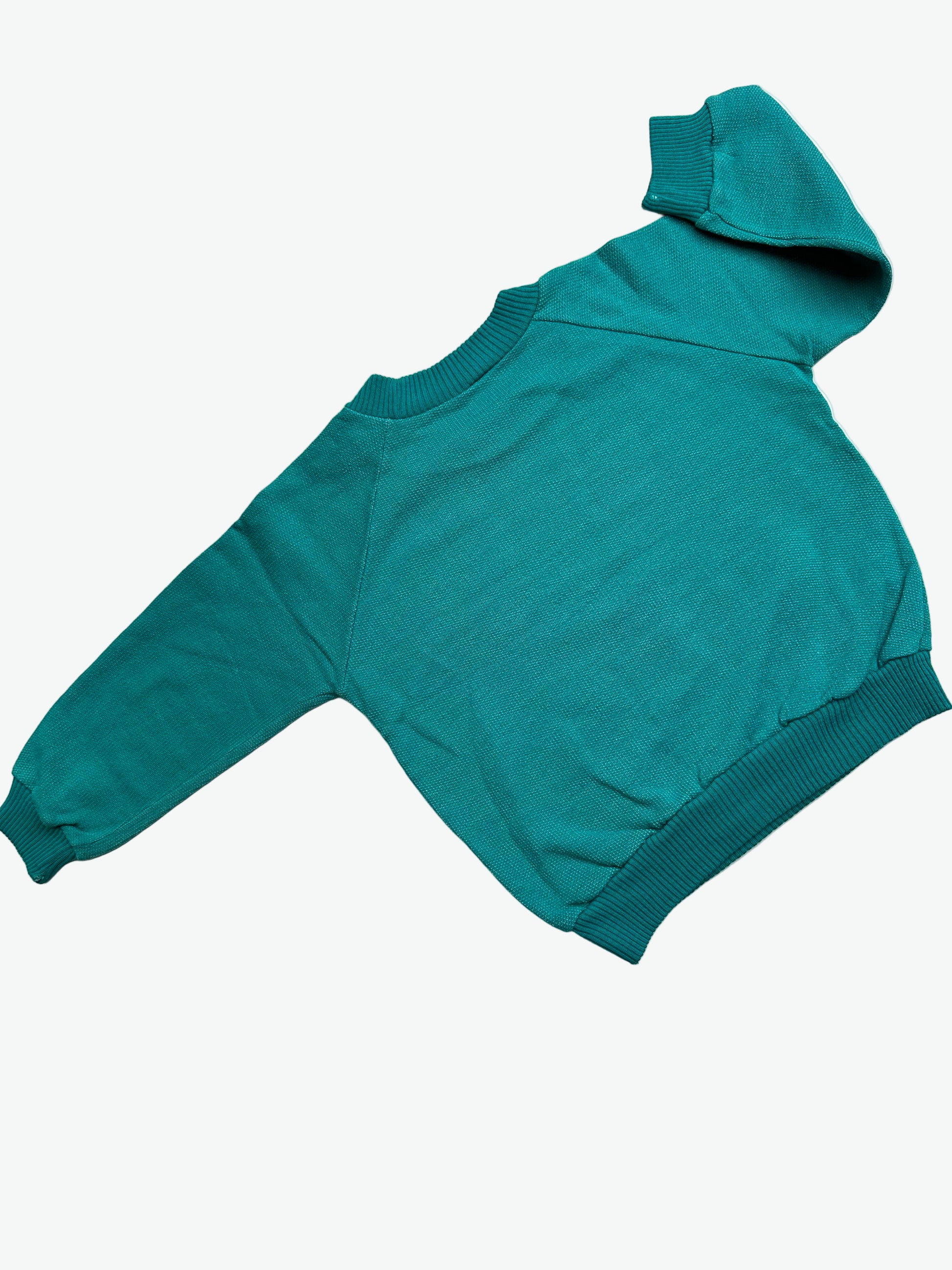 kids vintage Teal snoopy ski print sweatshirt jumper on a white background