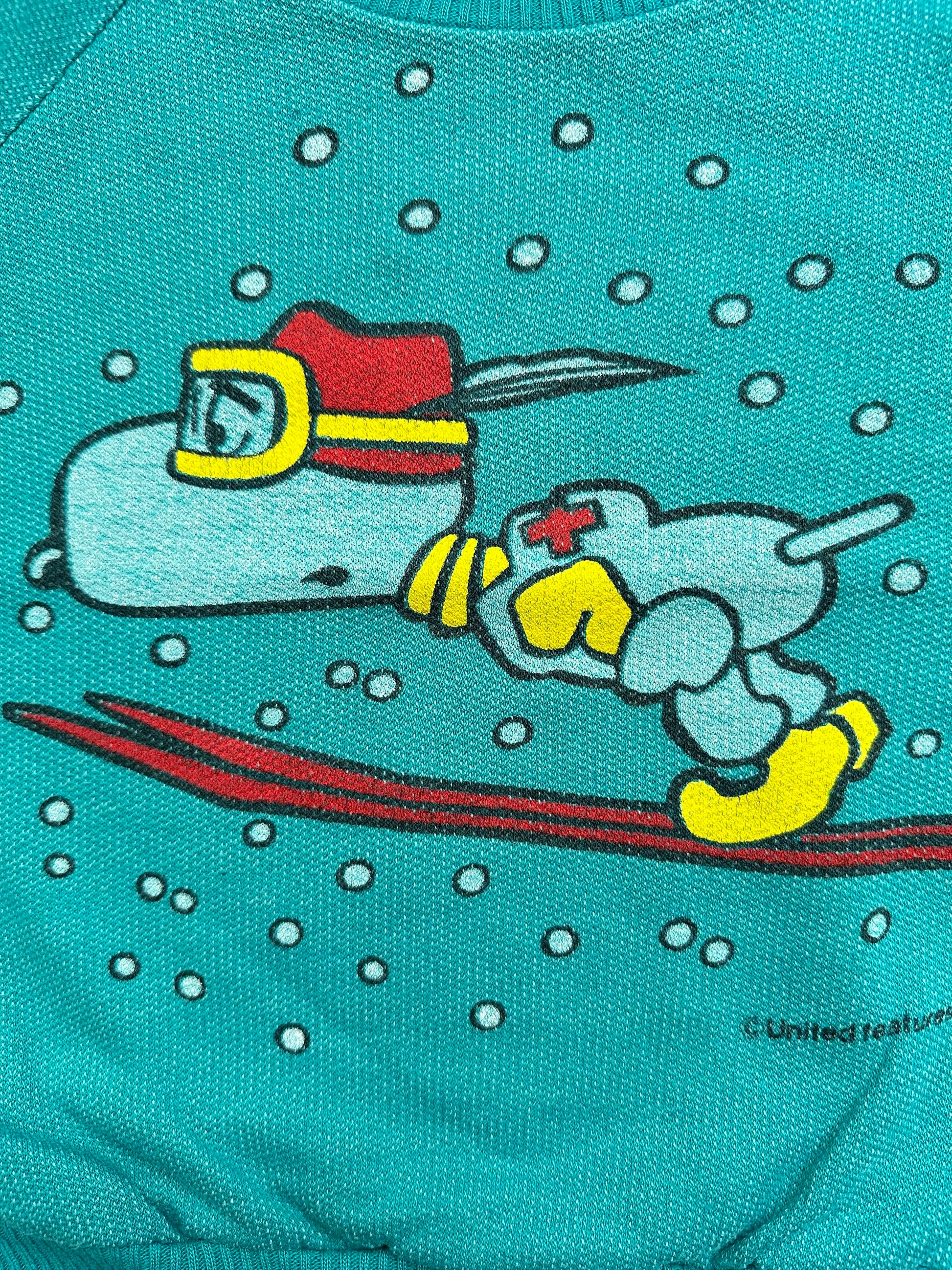 kids vintage Teal snoopy ski print sweatshirt jumper on a white background