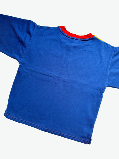 Kids vintage jumper branded Tamagotchi. Multi colour - red, blue and yellow, printed detail from 1996-1997. Age 10 years. 
