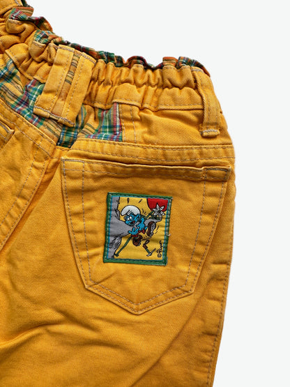 Kids vintage yellow trousers with smurf badge detail on back pocket and embroidery on the front. Tapered shape. Age 3-4 years/ 104cm. 