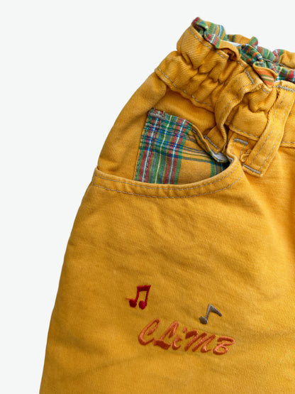 Kids vintage yellow trousers with smurf badge detail on back pocket and embroidery on the front. Tapered shape. Age 3-4 years/ 104cm. 